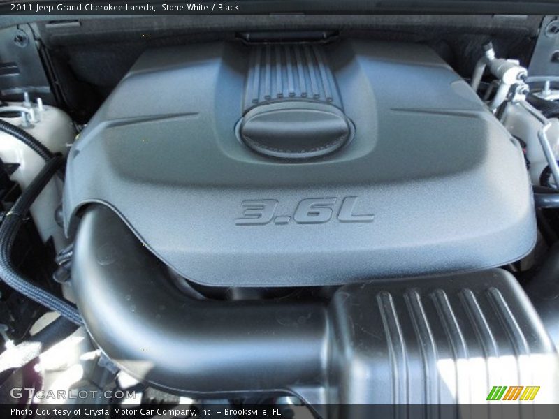 Stone White / Black 2011 Jeep Grand Cherokee Laredo