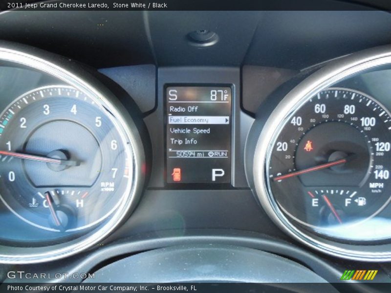 Stone White / Black 2011 Jeep Grand Cherokee Laredo