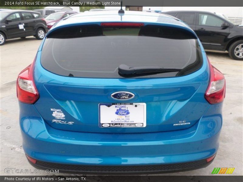 Blue Candy / Medium Light Stone 2014 Ford Focus SE Hatchback