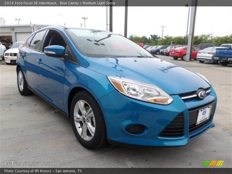 Blue Candy / Medium Light Stone 2014 Ford Focus SE Hatchback