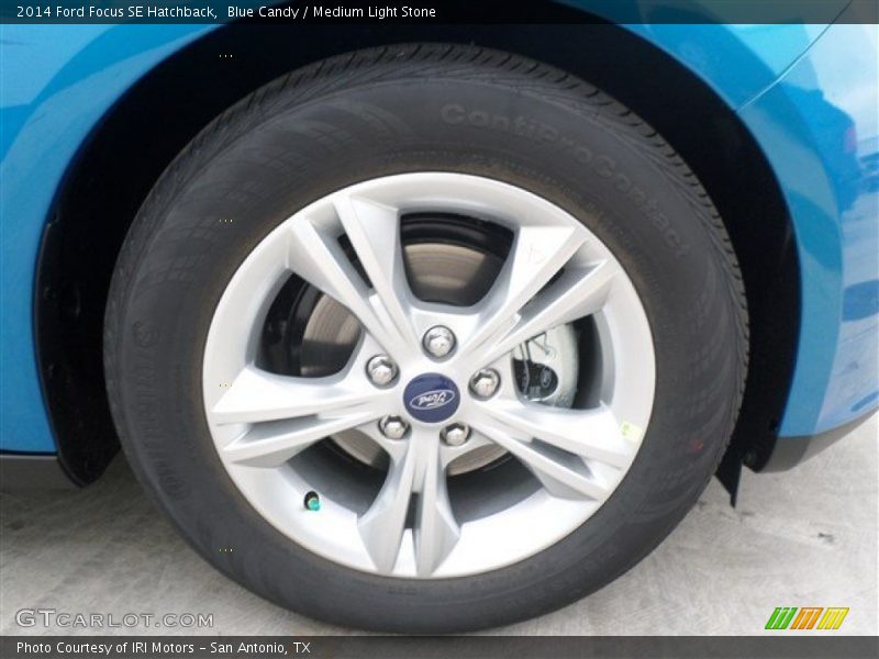 Blue Candy / Medium Light Stone 2014 Ford Focus SE Hatchback