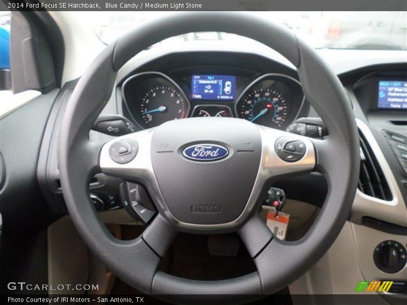 Blue Candy / Medium Light Stone 2014 Ford Focus SE Hatchback