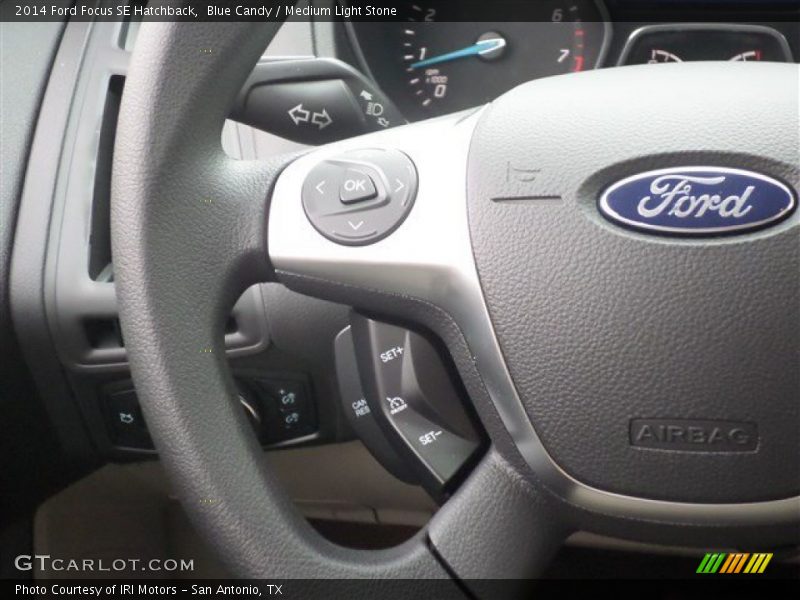 Blue Candy / Medium Light Stone 2014 Ford Focus SE Hatchback