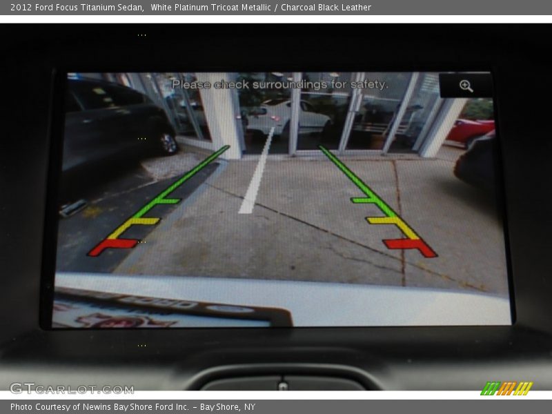 White Platinum Tricoat Metallic / Charcoal Black Leather 2012 Ford Focus Titanium Sedan