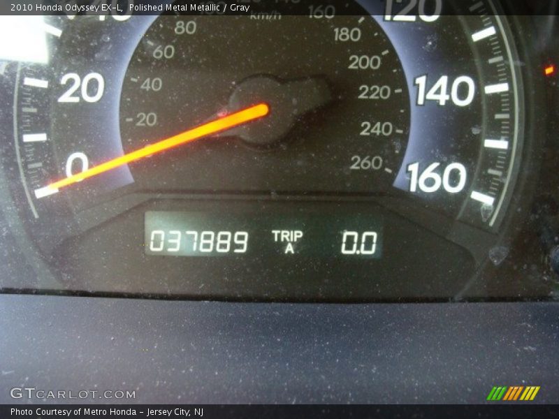 Polished Metal Metallic / Gray 2010 Honda Odyssey EX-L