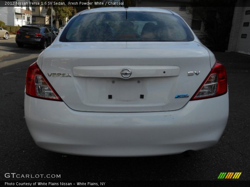 Fresh Powder White / Charcoal 2012 Nissan Versa 1.6 SV Sedan
