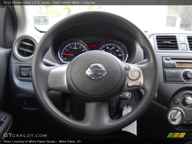 Fresh Powder White / Charcoal 2012 Nissan Versa 1.6 SV Sedan