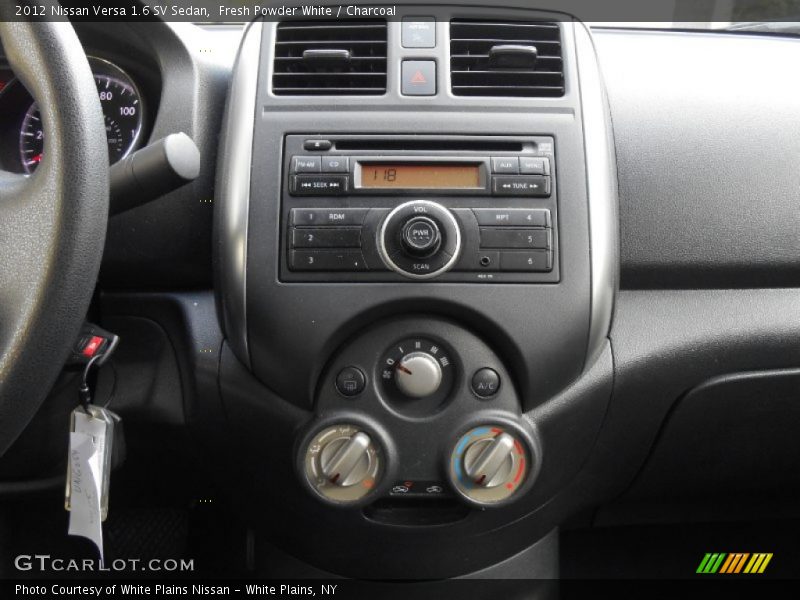 Fresh Powder White / Charcoal 2012 Nissan Versa 1.6 SV Sedan