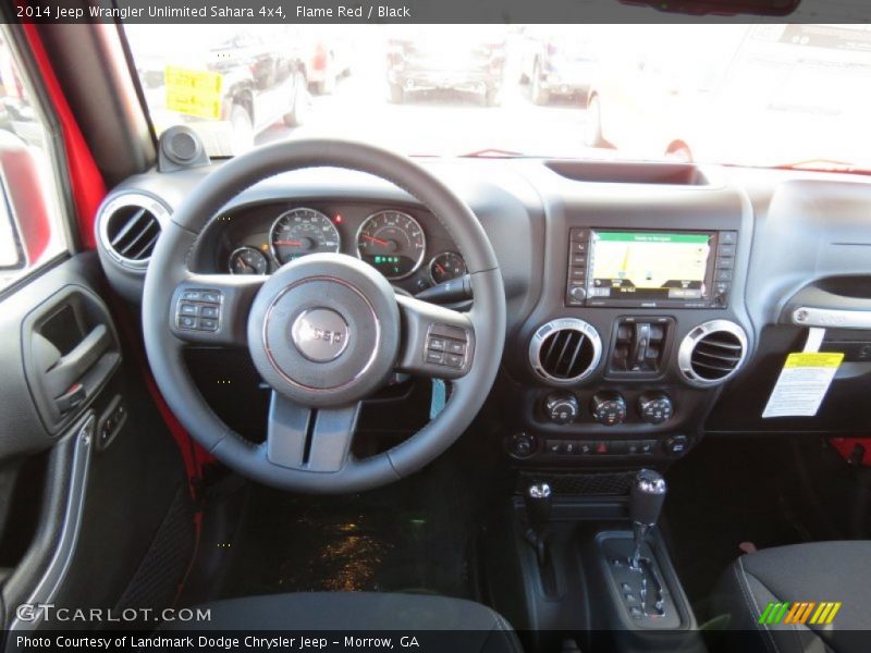 Dashboard of 2014 Wrangler Unlimited Sahara 4x4