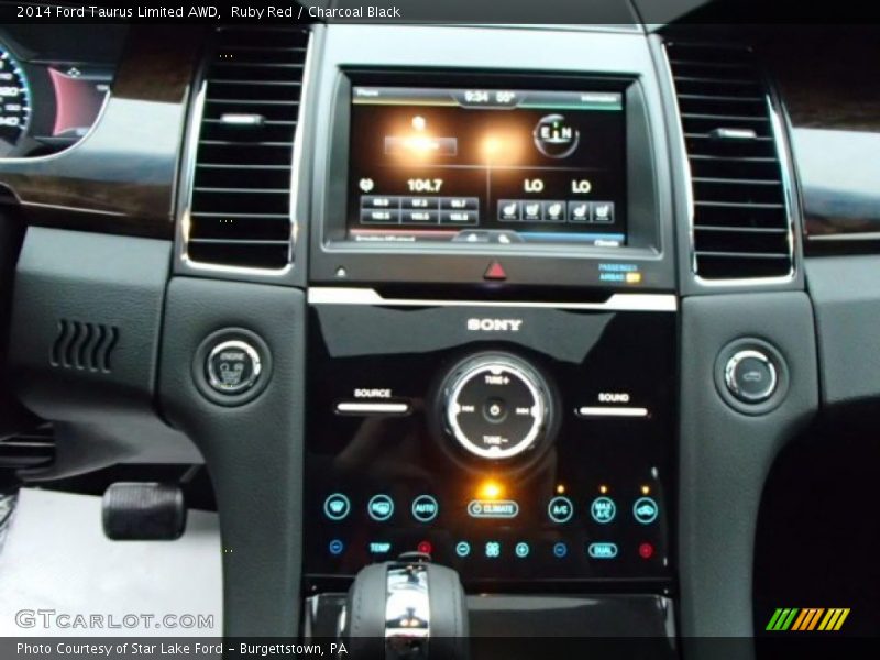 Ruby Red / Charcoal Black 2014 Ford Taurus Limited AWD