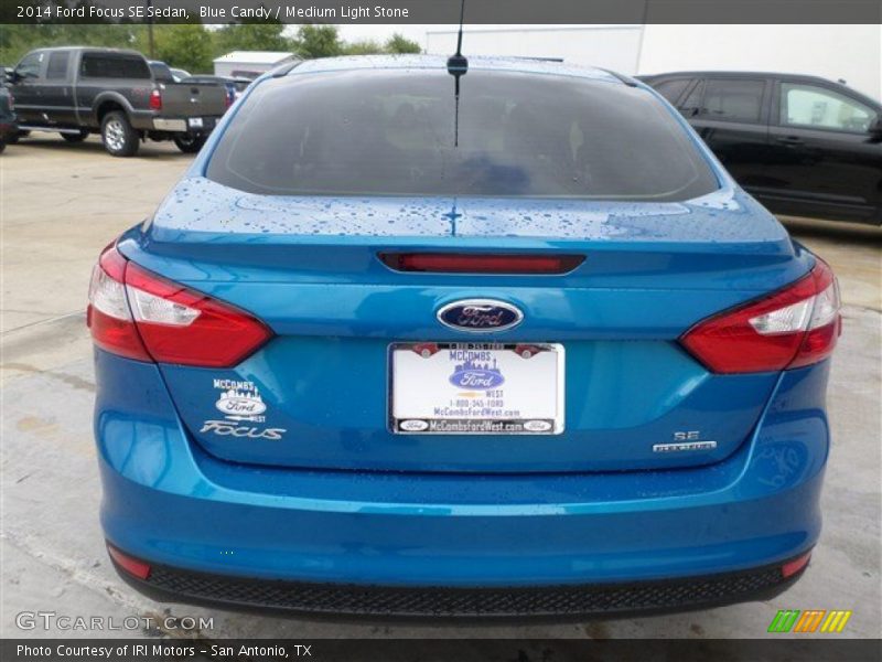 Blue Candy / Medium Light Stone 2014 Ford Focus SE Sedan