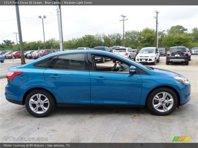 Blue Candy / Medium Light Stone 2014 Ford Focus SE Sedan