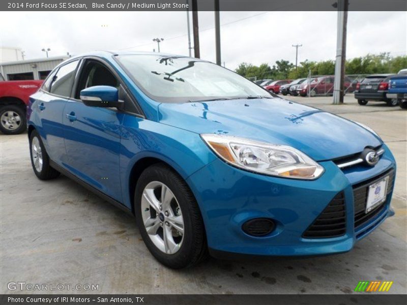 Blue Candy / Medium Light Stone 2014 Ford Focus SE Sedan