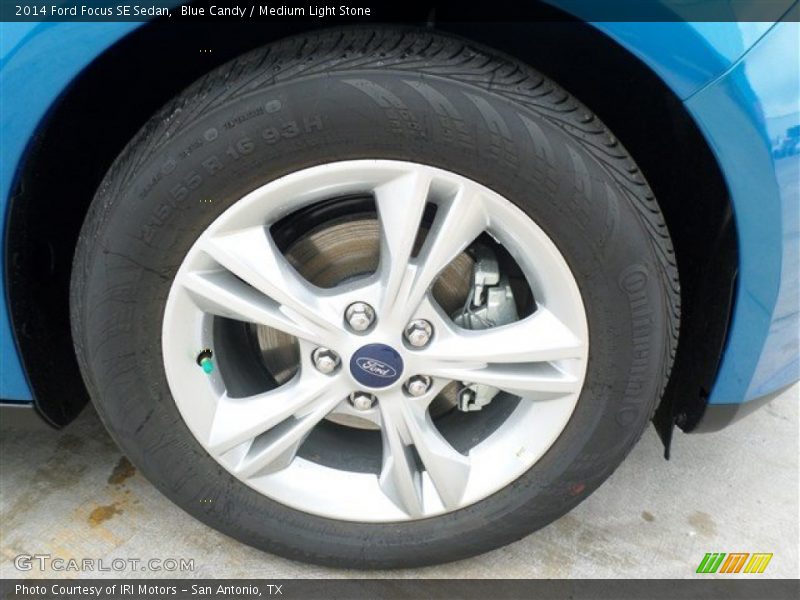 Blue Candy / Medium Light Stone 2014 Ford Focus SE Sedan