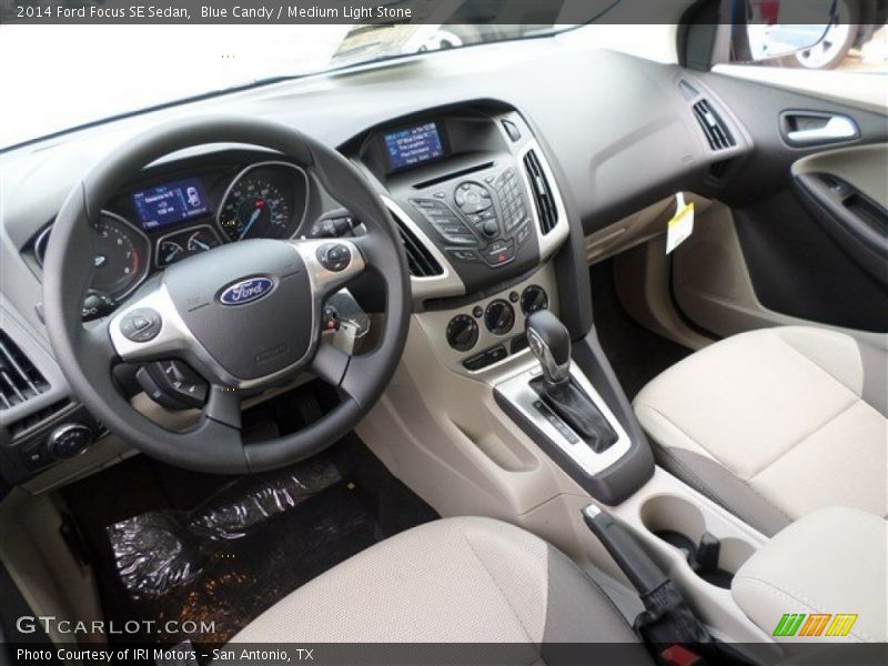 Blue Candy / Medium Light Stone 2014 Ford Focus SE Sedan
