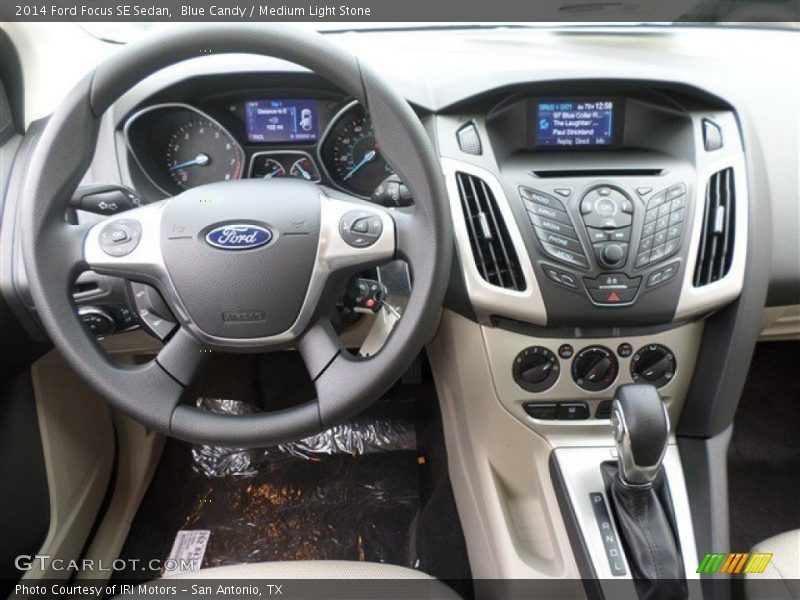 Blue Candy / Medium Light Stone 2014 Ford Focus SE Sedan