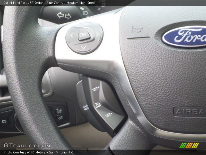 Blue Candy / Medium Light Stone 2014 Ford Focus SE Sedan