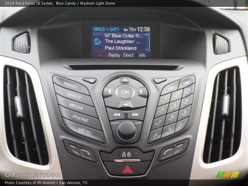 Blue Candy / Medium Light Stone 2014 Ford Focus SE Sedan