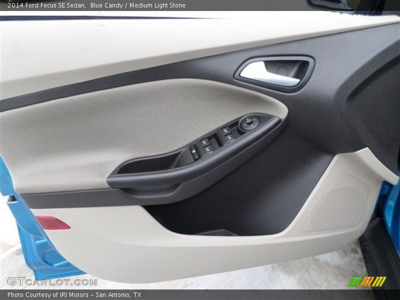 Blue Candy / Medium Light Stone 2014 Ford Focus SE Sedan