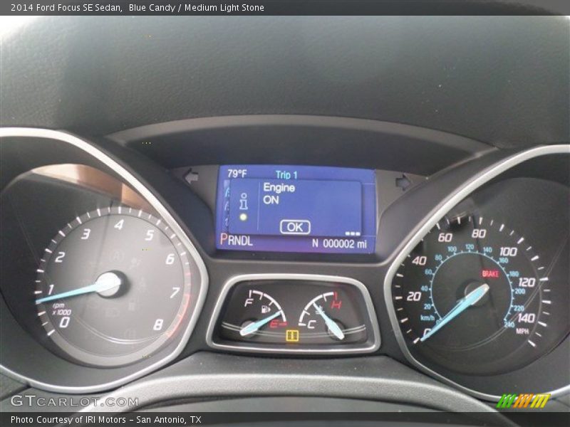 Blue Candy / Medium Light Stone 2014 Ford Focus SE Sedan