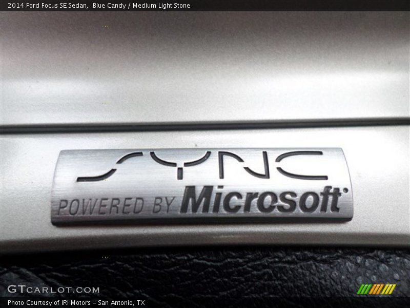 Blue Candy / Medium Light Stone 2014 Ford Focus SE Sedan