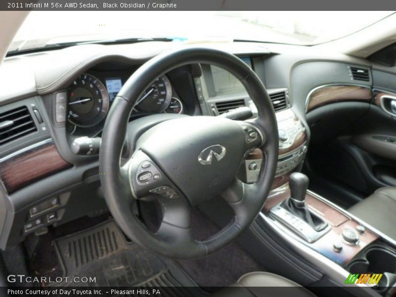 Dashboard of 2011 M 56x AWD Sedan