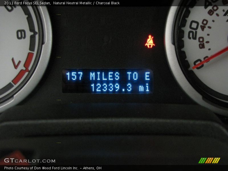 Natural Neutral Metallic / Charcoal Black 2011 Ford Focus SEL Sedan