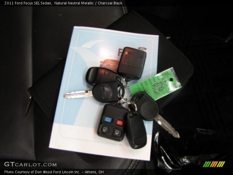 Natural Neutral Metallic / Charcoal Black 2011 Ford Focus SEL Sedan