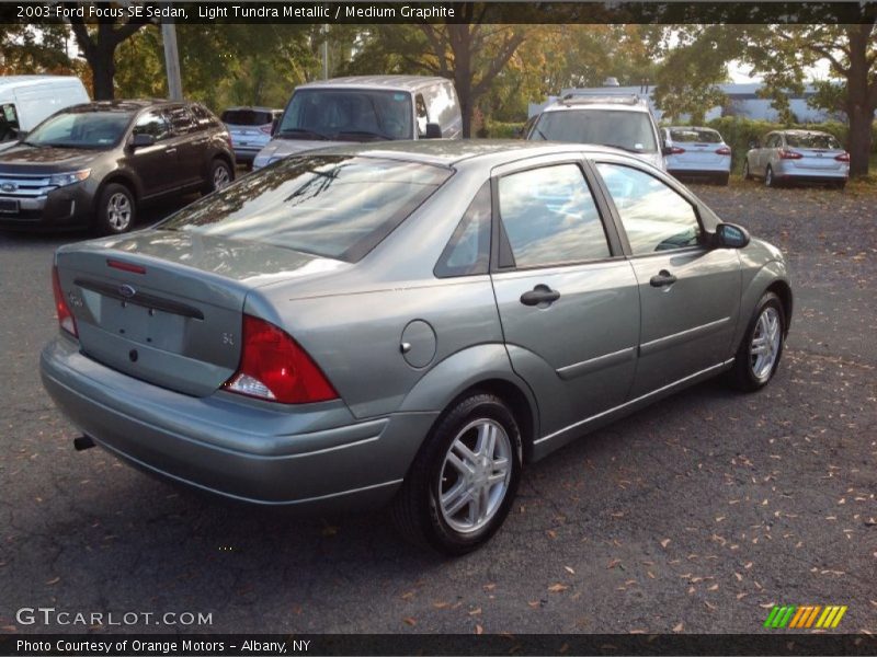 Light Tundra Metallic / Medium Graphite 2003 Ford Focus SE Sedan