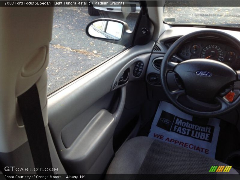 Light Tundra Metallic / Medium Graphite 2003 Ford Focus SE Sedan