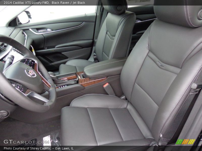 Front Seat of 2014 XTS Luxury FWD