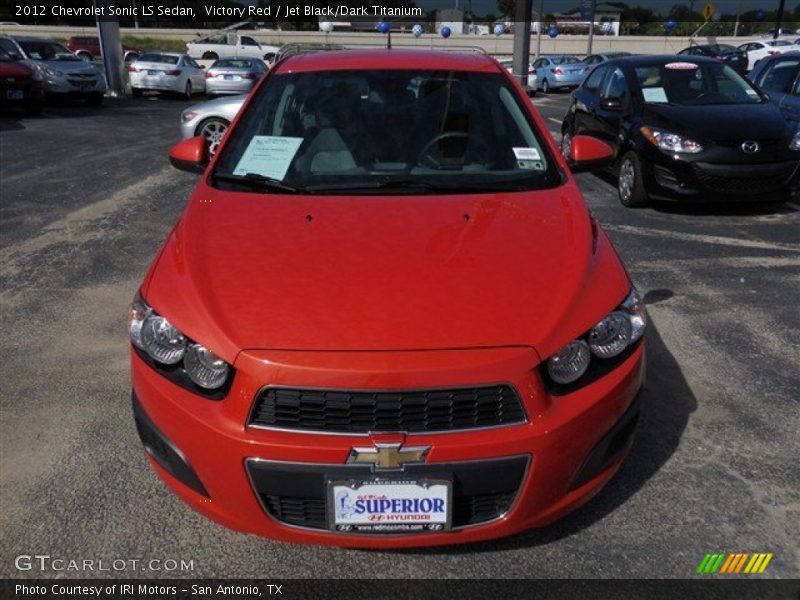 Victory Red / Jet Black/Dark Titanium 2012 Chevrolet Sonic LS Sedan