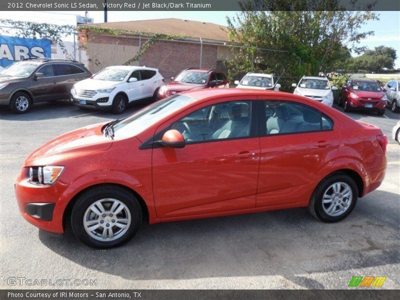 Victory Red / Jet Black/Dark Titanium 2012 Chevrolet Sonic LS Sedan