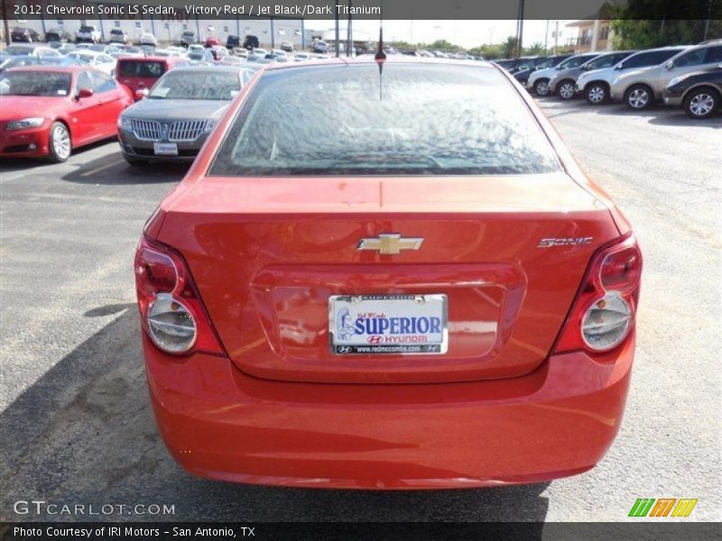 Victory Red / Jet Black/Dark Titanium 2012 Chevrolet Sonic LS Sedan