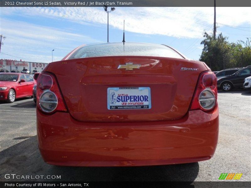 Victory Red / Jet Black/Dark Titanium 2012 Chevrolet Sonic LS Sedan