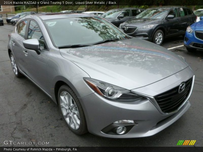 Front 3/4 View of 2014 MAZDA3 s Grand Touring 5 Door