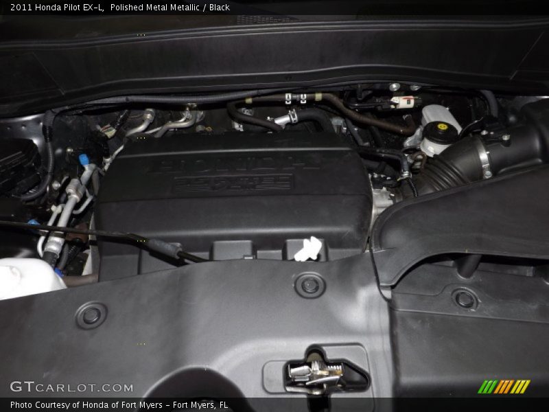 Polished Metal Metallic / Black 2011 Honda Pilot EX-L