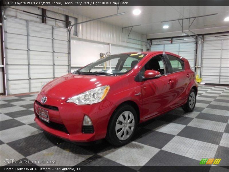 Absolutely Red / Light Blue Gray/Black 2012 Toyota Prius c Hybrid Three