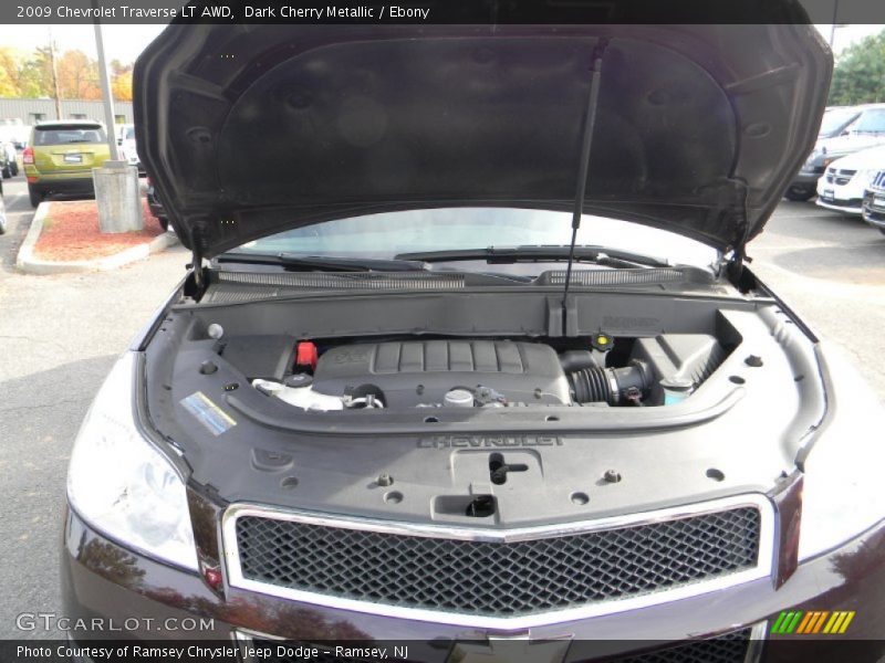 Dark Cherry Metallic / Ebony 2009 Chevrolet Traverse LT AWD