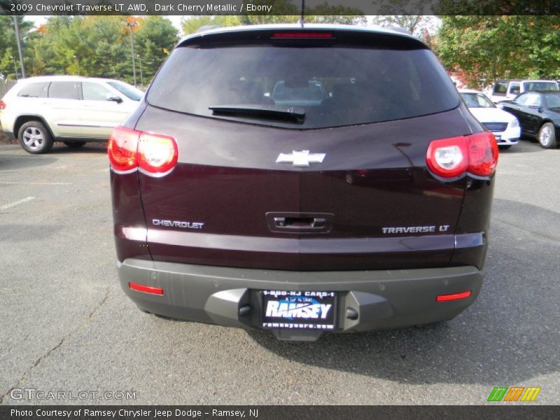 Dark Cherry Metallic / Ebony 2009 Chevrolet Traverse LT AWD