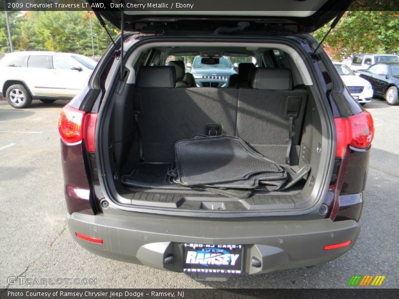 Dark Cherry Metallic / Ebony 2009 Chevrolet Traverse LT AWD