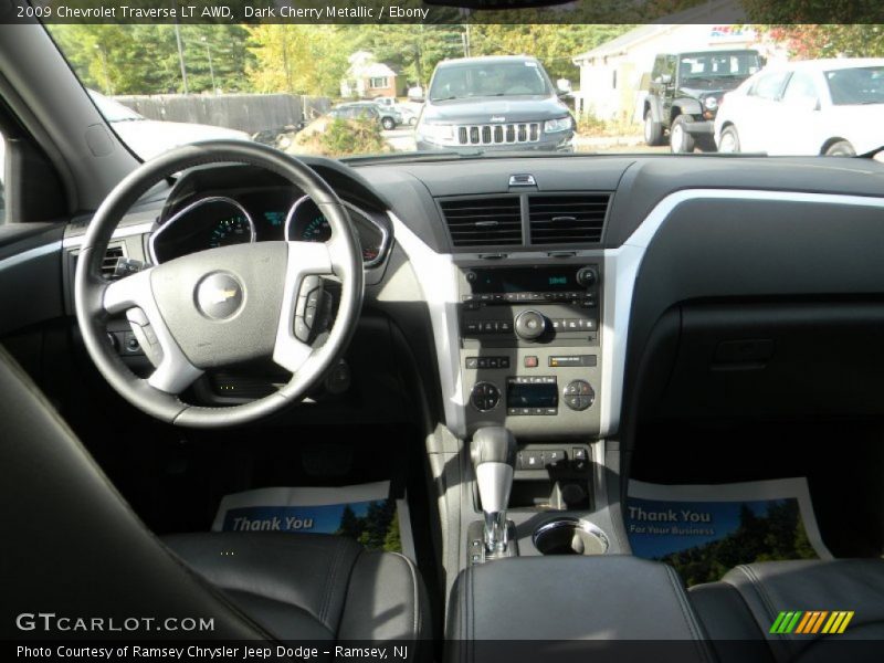 Dark Cherry Metallic / Ebony 2009 Chevrolet Traverse LT AWD