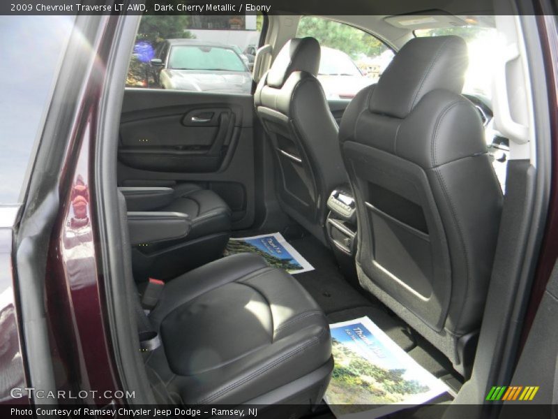 Dark Cherry Metallic / Ebony 2009 Chevrolet Traverse LT AWD