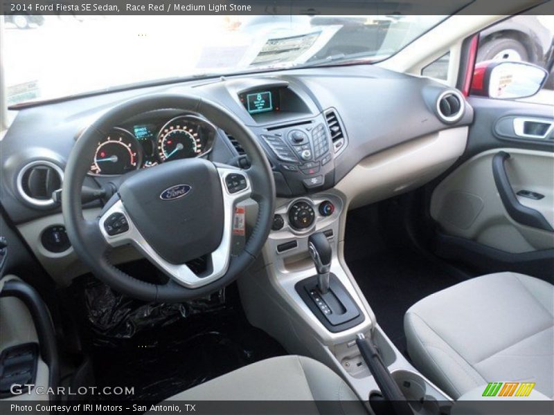 Race Red / Medium Light Stone 2014 Ford Fiesta SE Sedan