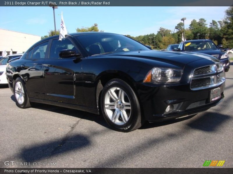 Pitch Black / Black/Radar Red 2011 Dodge Charger R/T Plus