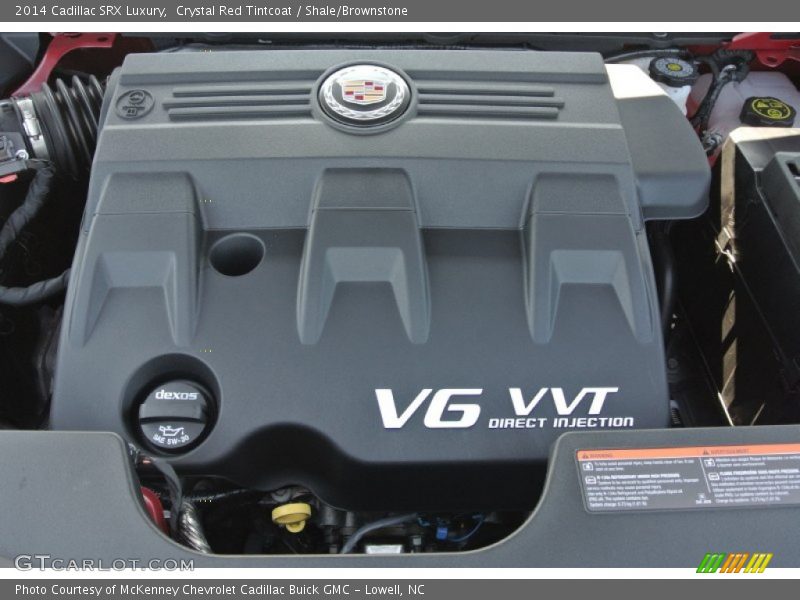 Crystal Red Tintcoat / Shale/Brownstone 2014 Cadillac SRX Luxury