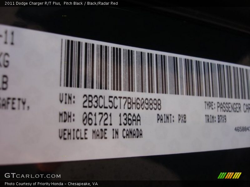 Pitch Black / Black/Radar Red 2011 Dodge Charger R/T Plus