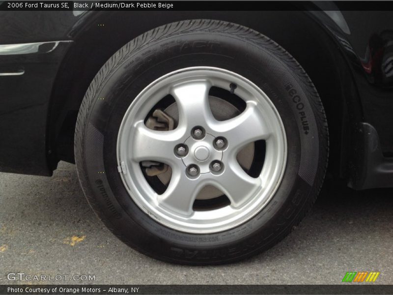 Black / Medium/Dark Pebble Beige 2006 Ford Taurus SE