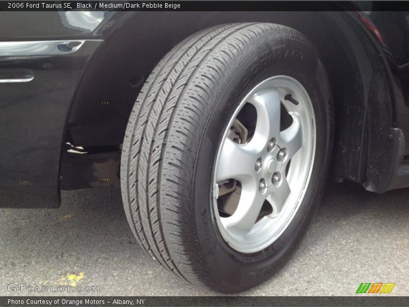 Black / Medium/Dark Pebble Beige 2006 Ford Taurus SE