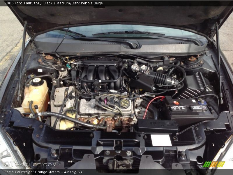 Black / Medium/Dark Pebble Beige 2006 Ford Taurus SE